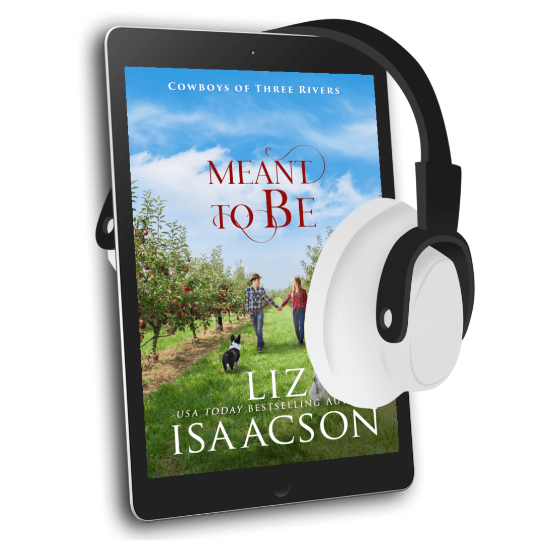 E-reader with 'Meant to Be' book cover and headphones on a white background