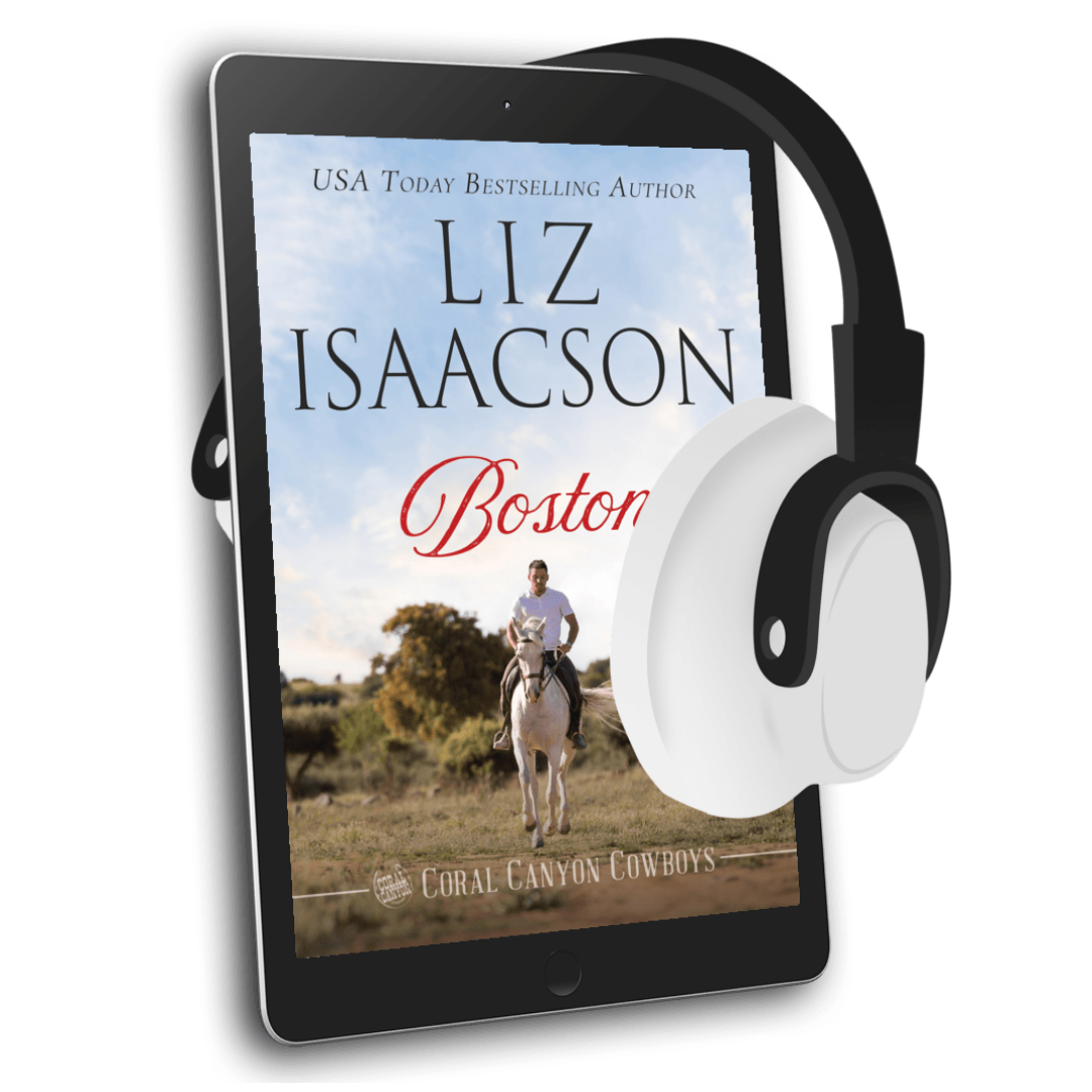 E-reader displaying a book cover with a person on a horse, accompanied by headphones.