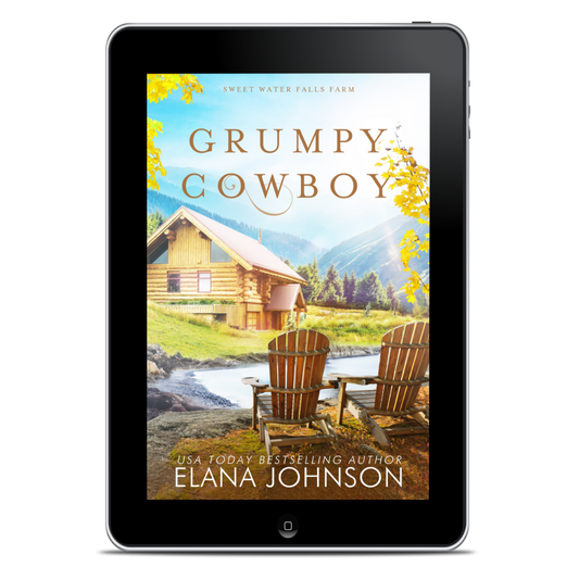 A tablet device displaying the book cover for 'Grumpy Cowboy' by Elana Johnson, set against a plain white background.