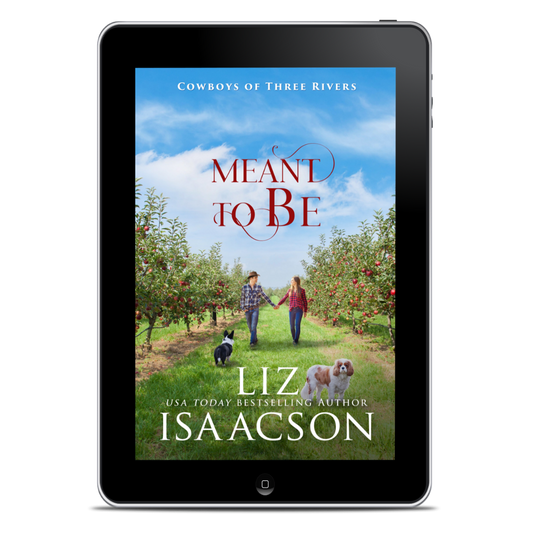 Tablet displaying the book cover of 'Meant to Be' by Liz Isaacson in an apple orchard.