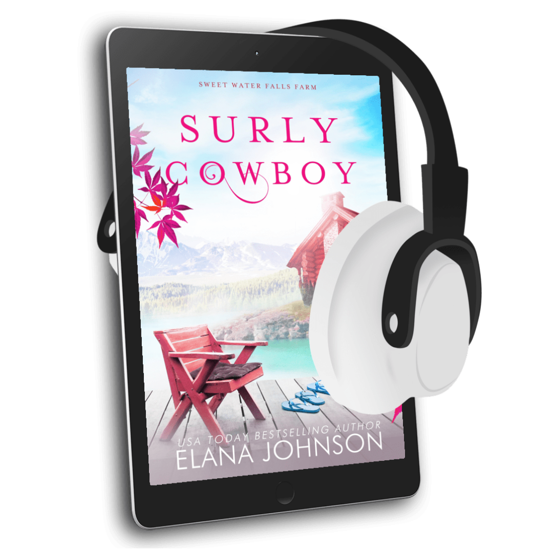 A tablet device with white and black over-ear headphones resting on top, displaying the book cover for 'Surly Cowboy' by Elana Johnson on a clean white background.