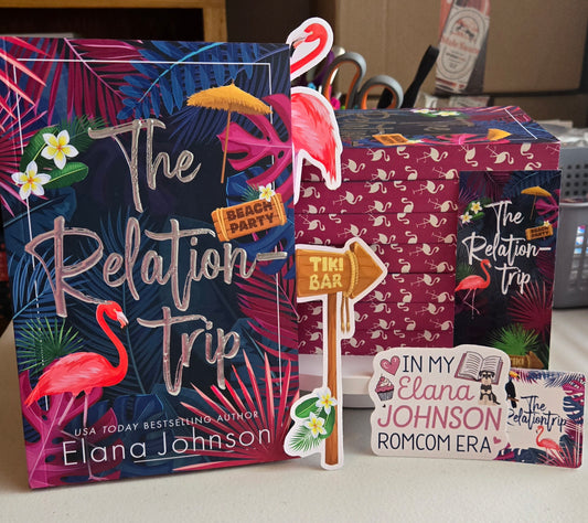 Book titled 'The Relation Trip' by Elana Johnson with promotional materials on a surface.