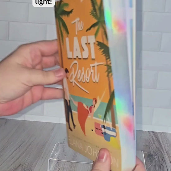 A video of the Beach Read Double, with captions, showing the book, the interior, the cover, and the foiled edge.